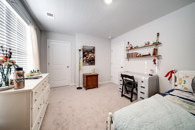 701 Dallas Dr, Columbia, TN 38401 - bedroom featuring light carpet and baseboards