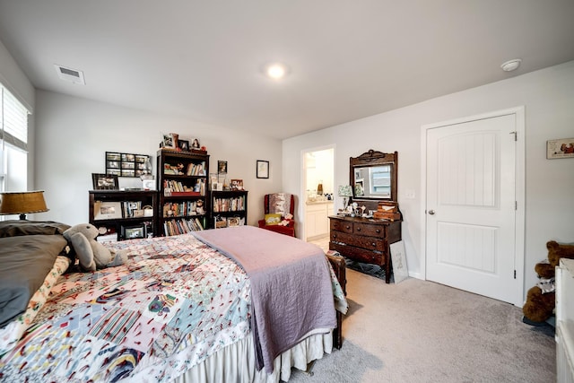 701 Dallas Dr, Columbia, TN 38401 - bedroom with light colored carpet and ensuite bathroom