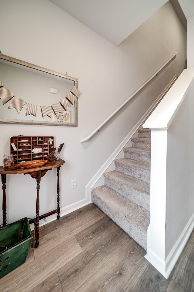 701 Dallas Dr, Columbia, TN 38401 - stairs with wood finished floors and baseboards