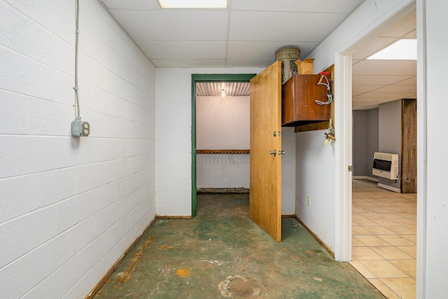 5141 Tranham Rd, Whites Creek, TN 37189 - hall featuring a drop ceiling, heating unit, concrete block wall, and concrete flooring