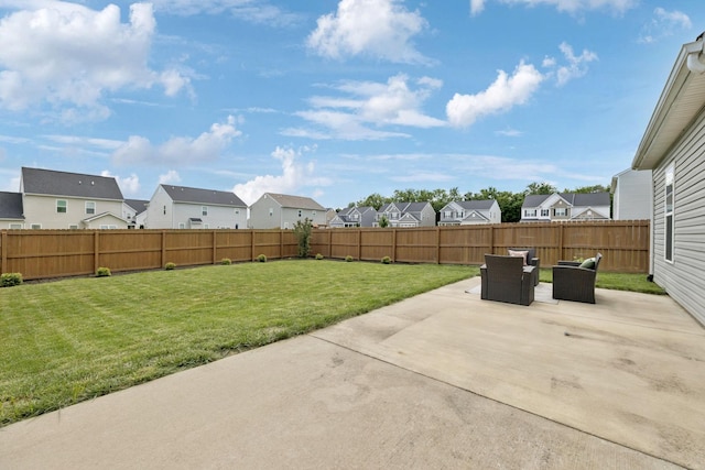 9007 Outpost Dr, Spring Hill, TN 37174 - fenced backyard featuring a residential view, a patio area, and an outdoor hangout area