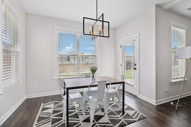9007 Outpost Dr, Spring Hill, TN 37174 - dining space with wood finished floors, healthy amount of natural light, and a chandelier