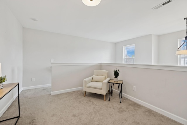 9007 Outpost Dr, Spring Hill, TN 37174 - living area featuring plenty of natural light and carpet flooring