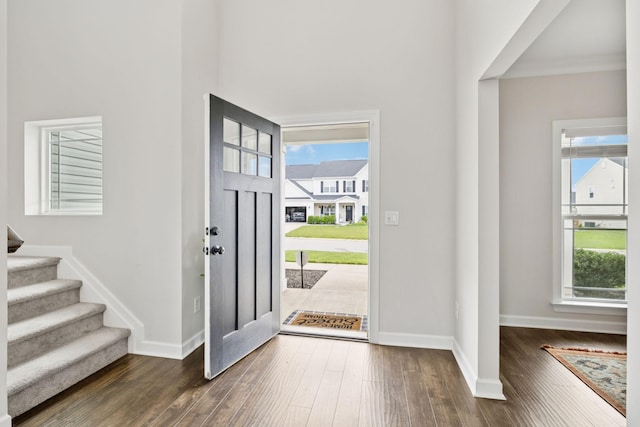 9007 Outpost Dr, Spring Hill, TN 37174 - entrance foyer with dark wood finished floors, plenty of natural light, and stairs