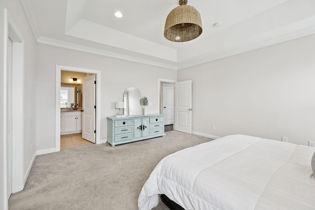 9007 Outpost Dr, Spring Hill, TN 37174 - bedroom with light carpet, a tray ceiling, ensuite bath, and crown molding