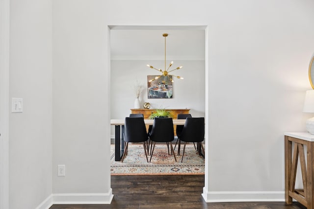 9007 Outpost Dr, Spring Hill, TN 37174 - dining room with wood finished floors, a chandelier, and ornamental molding