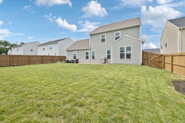 9007 Outpost Dr, Spring Hill, TN 37174 - back of house featuring a fenced backyard and a residential view