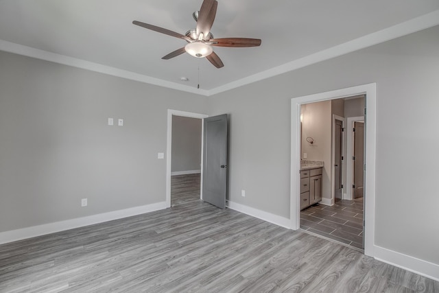 524 Haviture Way, Murfreesboro, TN 37129 - unfurnished bedroom featuring light wood-style flooring, ensuite bathroom, and a ceiling fan