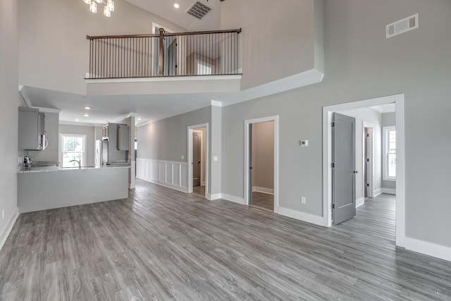 524 Haviture Way, Murfreesboro, TN 37129 - unfurnished living room featuring a high ceiling, light wood finished floors, recessed lighting, and a chandelier