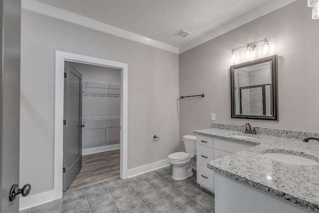 514 Haviture Way, Murfreesboro, TN 37129 - bathroom featuring vanity, tile patterned floors, a spacious closet, and ornamental molding
