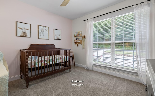 750 S Seminole Dr, Chattanooga, TN 37412 - bedroom with carpet flooring, a ceiling fan, and a nursery area