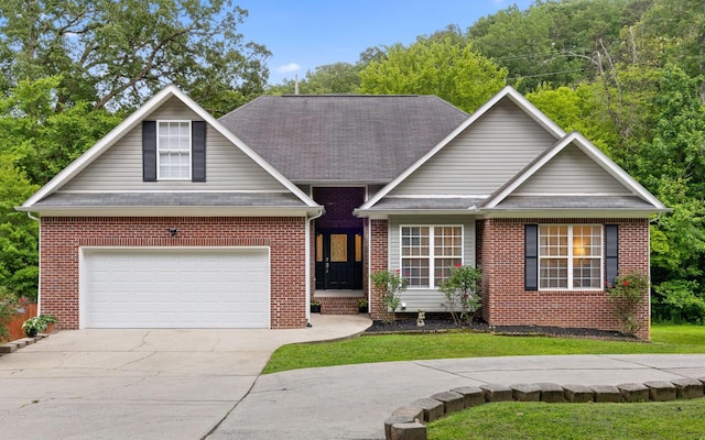 750 S Seminole Dr, Chattanooga, TN 37412 - traditional home with brick siding, concrete driveway, and a front lawn