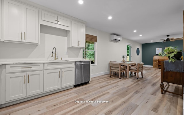750 S Seminole Dr, Chattanooga, TN 37412 - kitchen with dishwasher, a wall unit AC, recessed lighting, light countertops, and white cabinets