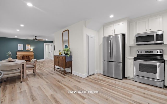 750 S Seminole Dr, Chattanooga, TN 37412 - kitchen with appliances with stainless steel finishes, light wood finished floors, recessed lighting, a ceiling fan, and white cabinets