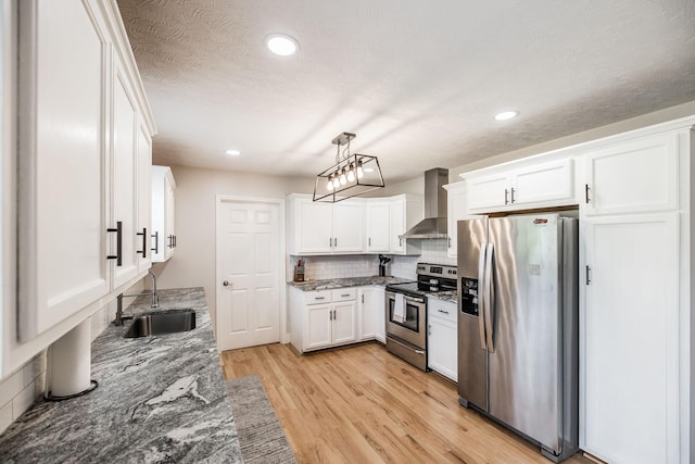 1004 Meridian Dr, Castalian Springs, TN 37031 - kitchen featuring stainless steel appliances, wall chimney exhaust hood, white cabinetry, light stone counters, and recessed lighting