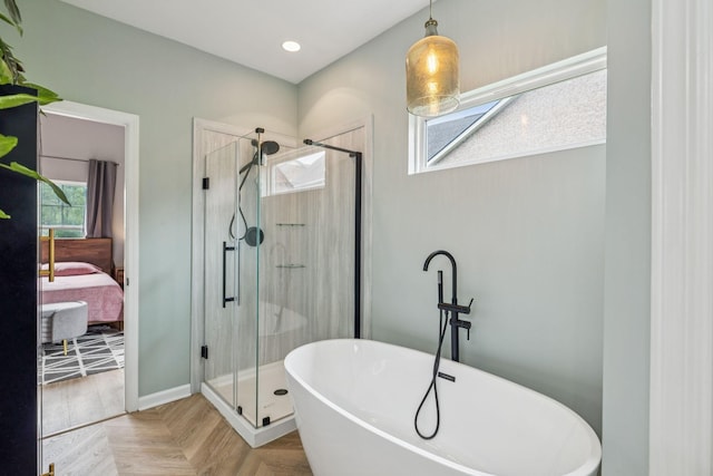 3022 Honeysuckle Dr, Spring Hill, TN 37174 - full bathroom with ensuite bath, a freestanding tub, a shower stall, and recessed lighting