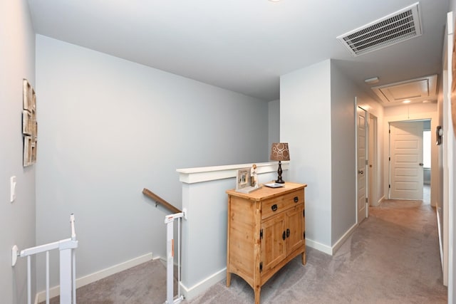2004 Hardwick Ln, Gallatin, TN 37066 - hallway with an upstairs landing, attic access, and light carpet