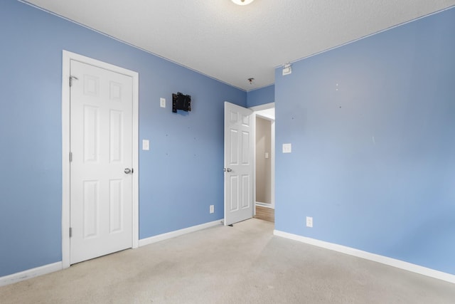2276 Yeager Dr, Clarksville, TN 37040 - unfurnished bedroom featuring carpet floors and a textured ceiling