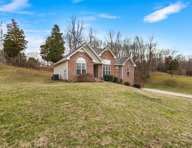 2276 Yeager Dr, Clarksville, TN 37040 - ranch-style home featuring brick siding and a front lawn