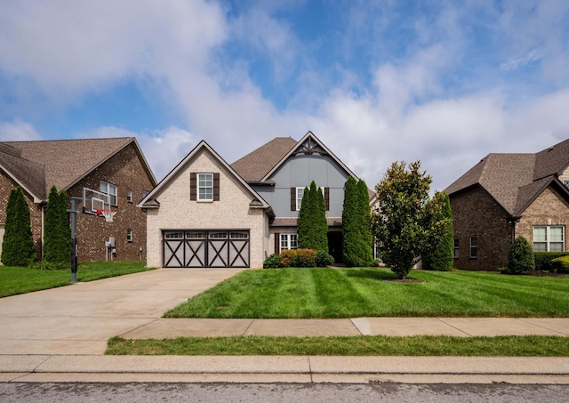 1241 Hensfield Dr, Murfreesboro, TN 37128 - view of front of house featuring an attached garage, a front yard, driveway, and brick siding