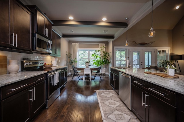 1241 Hensfield Dr, Murfreesboro, TN 37128 - kitchen with appliances with stainless steel finishes, light stone countertops, decorative backsplash, dark wood-type flooring, and decorative light fixtures