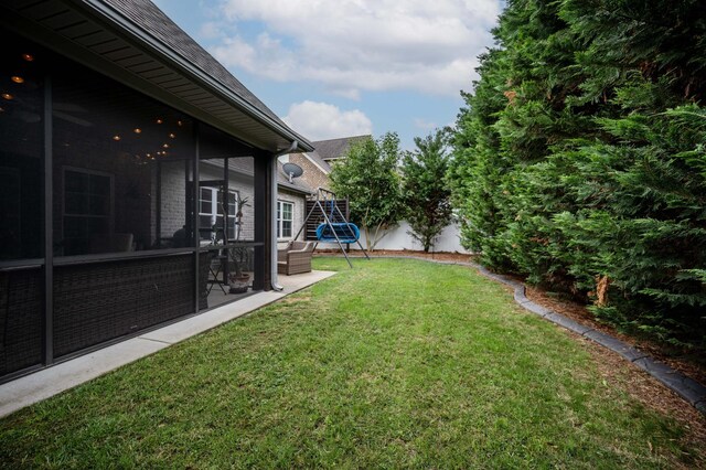1241 Hensfield Dr, Murfreesboro, TN 37128 - view of grassy yard with a sunroom and a patio area