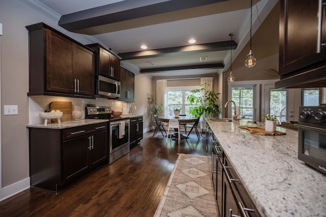 1241 Hensfield Dr, Murfreesboro, TN 37128 - kitchen with stainless steel appliances, decorative backsplash, light stone countertops, dark wood-type flooring, and dark brown cabinets