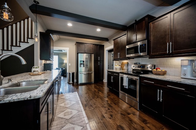 1241 Hensfield Dr, Murfreesboro, TN 37128 - kitchen featuring appliances with stainless steel finishes, backsplash, light stone countertops, dark wood finished floors, and recessed lighting