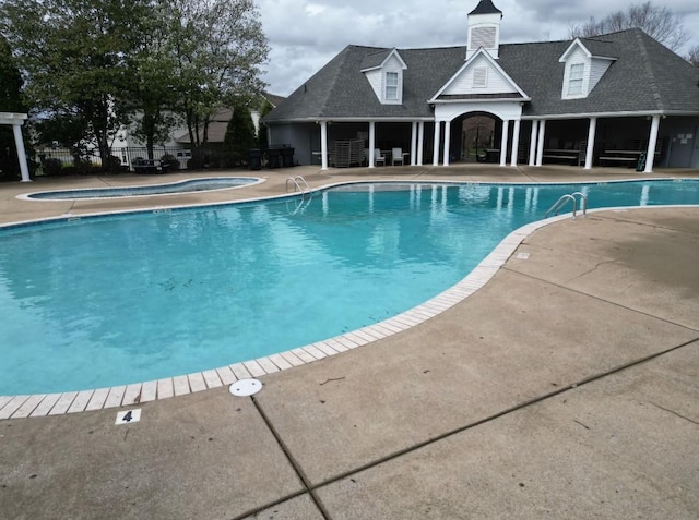 1241 Hensfield Dr, Murfreesboro, TN 37128 - community pool with a patio and a hot tub