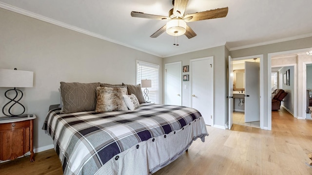 400 Westland Dr, Lebanon, TN 37087 - bedroom with light wood-type flooring, ornamental molding, and a ceiling fan