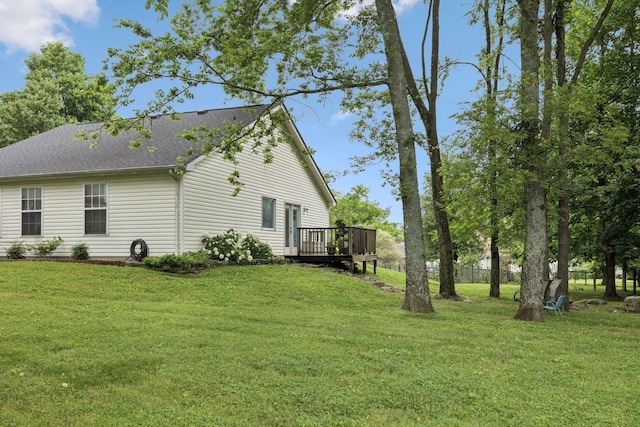 4012 Amber Way, Spring Hill, TN 37174 - view of home's exterior featuring a deck, a lawn, and roof with shingles