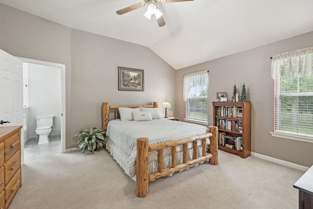 4012 Amber Way, Spring Hill, TN 37174 - bedroom featuring vaulted ceiling, light carpet, ensuite bathroom, and ceiling fan