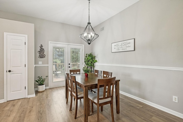 4012 Amber Way, Spring Hill, TN 37174 - dining space featuring wood finished floors, a chandelier, and french doors