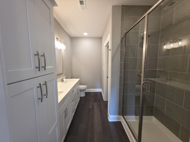 280 Turkey Crossing Ct, Clarksville, TN 37043 - bathroom with vanity, a shower stall, wood finished floors, and recessed lighting