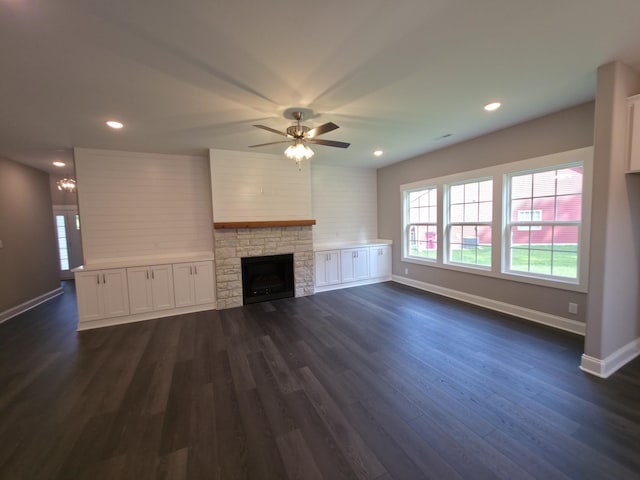 280 Turkey Crossing Ct, Clarksville, TN 37043 - unfurnished living room with dark wood-style flooring, a ceiling fan, a fireplace, and recessed lighting