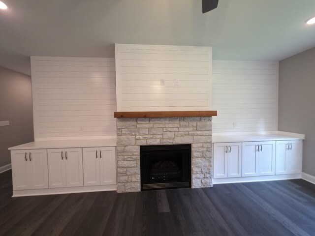 280 Turkey Crossing Ct, Clarksville, TN 37043 - unfurnished living room featuring dark wood-type flooring, a stone fireplace, and recessed lighting