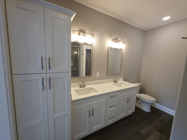 280 Turkey Crossing Ct, Clarksville, TN 37043 - bathroom featuring double vanity, a shower, wood finished floors, and recessed lighting