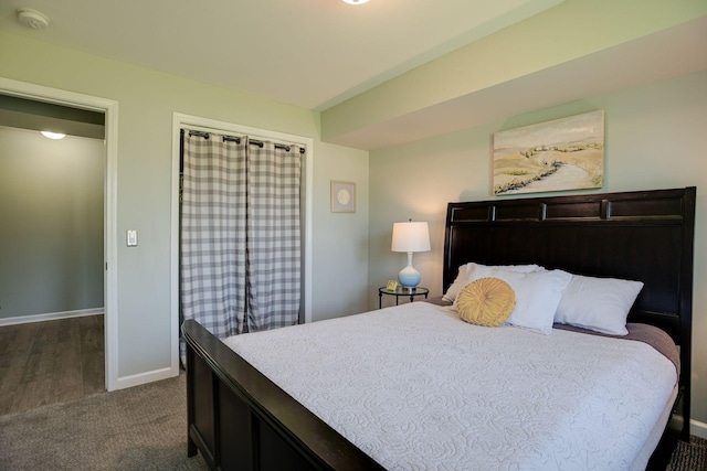 613 Hillsboro Rd Unit D27, Franklin, TN 37064 - bedroom featuring baseboards and dark carpet