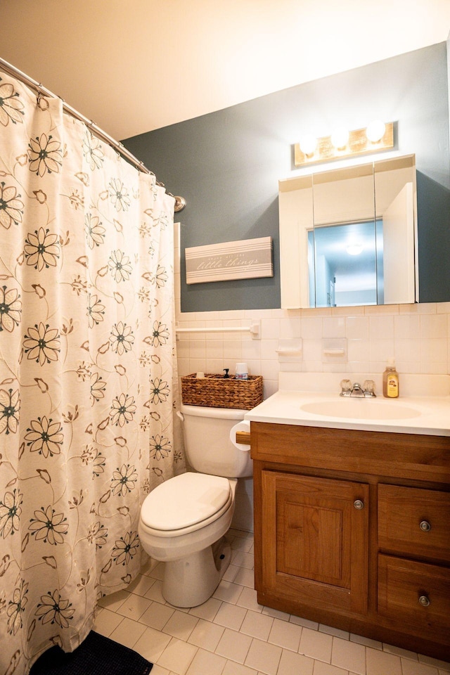 613 Hillsboro Rd Unit D27, Franklin, TN 37064 - full bathroom featuring vanity, tile patterned flooring, tile walls, a shower with curtain, and backsplash