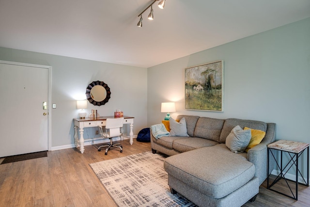 613 Hillsboro Rd Unit D27, Franklin, TN 37064 - living room with wood finished floors, an office area, and rail lighting