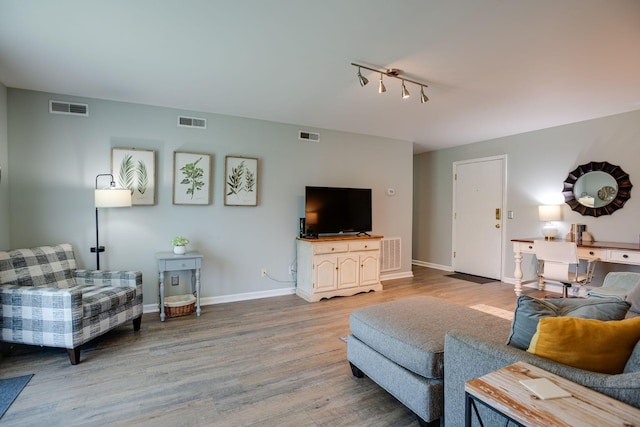 613 Hillsboro Rd Unit D27, Franklin, TN 37064 - living area featuring wood finished floors and rail lighting
