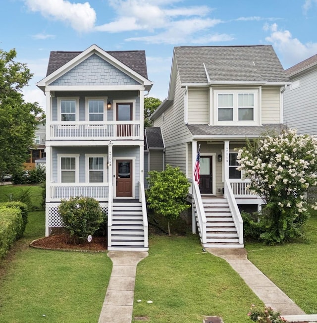 4704B Michigan Ave, Nashville, TN 37209 - view of front of house with a porch, stairs, and a front yard