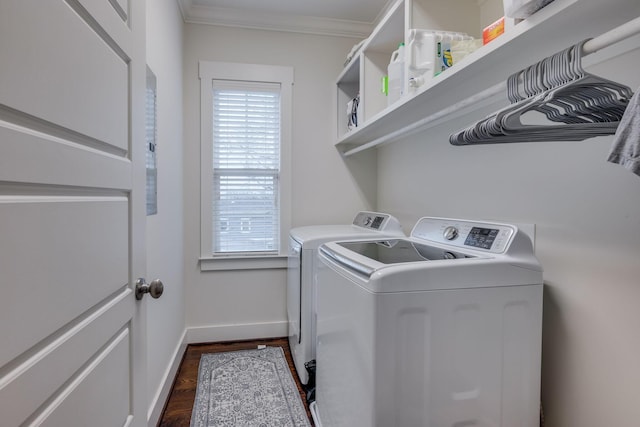 4704B Michigan Ave, Nashville, TN 37209 - laundry area featuring washing machine and dryer, ornamental molding, and dark wood-type flooring
