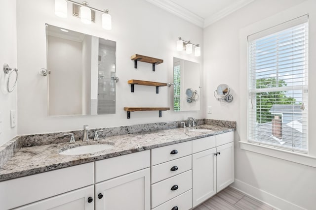 4704B Michigan Ave, Nashville, TN 37209 - bathroom featuring plenty of natural light, double vanity, crown molding, and a shower