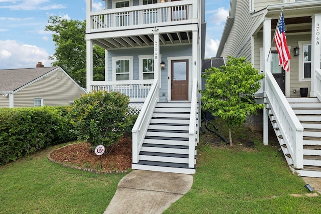 4704B Michigan Ave, Nashville, TN 37209 - view of front of house featuring stairway, a balcony, a front yard, and a porch