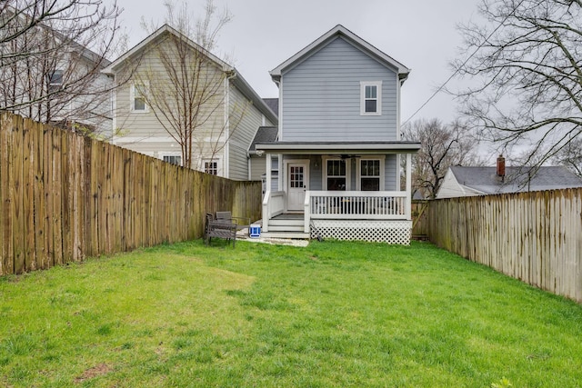 4704B Michigan Ave, Nashville, TN 37209 - back of house with a fenced backyard and covered porch