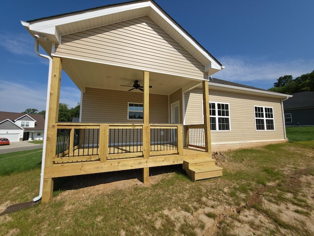 286 Turkey Crossing Ct, Clarksville, TN 37043 - back of property featuring ceiling fan, a deck, and a yard
