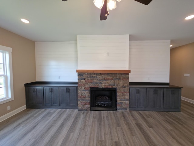 286 Turkey Crossing Ct, Clarksville, TN 37043 - unfurnished living room with ceiling fan, wood finished floors, a fireplace, and recessed lighting