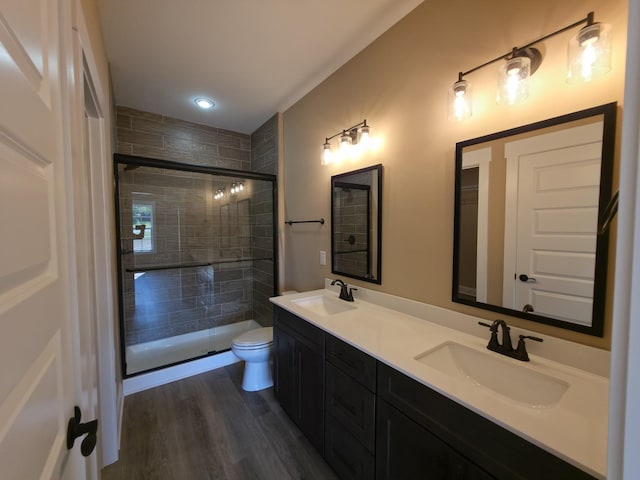 286 Turkey Crossing Ct, Clarksville, TN 37043 - full bathroom with double vanity, a shower stall, and wood finished floors