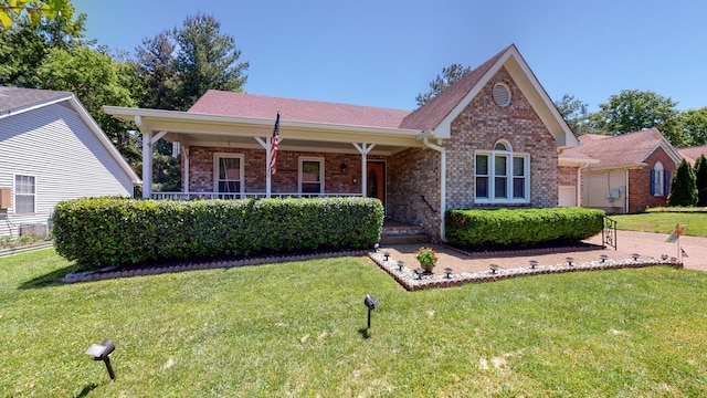 1503 Birchwood Cir, Franklin, TN 37064 - ranch-style house featuring brick siding, a front lawn, and a porch